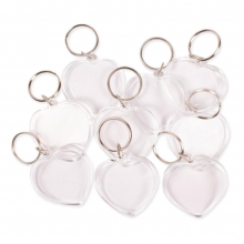 Hjärtformade nyckelringar med transparent hållare för foton, bilder eller etiketter.