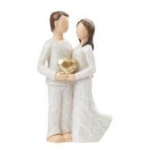 Bröllopspar Miniatyr - Brudpar som håller i ett stort guldhjärta - 8,3 cm