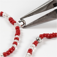 Knuttäckare till elastikt snöre Försilvrad 500 st Avslutningshylsa