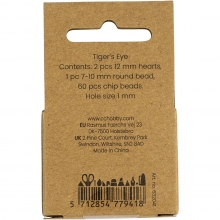 Närbild på bruna kristallpärlor i tigeröga.