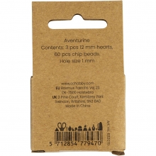 Närbild på korallfärgade kristallpärlor i aventurin.