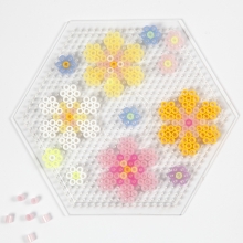 Blommor av rörpärlor och piprensare med pompoms DIY Inspiration
