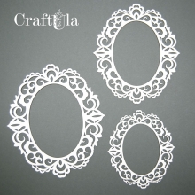 Tre detaljerade chipboardramar i beige naturton i olika storlekar med laserskurna ornament.