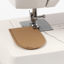 Fodral till nycklar och headset av läderpapper