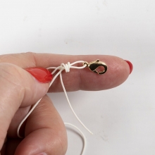 Polyestersnöre i mixade färger, 0,6 mm, 10x4 m.