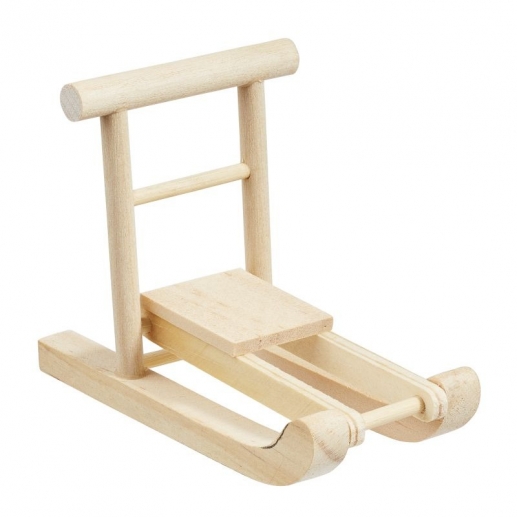 Sparkstötting av trä i miniatyrformat för nissen.