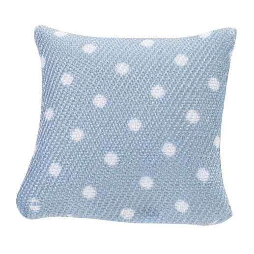 Miniatyr soffkuddar i blå färg med vita prickar.