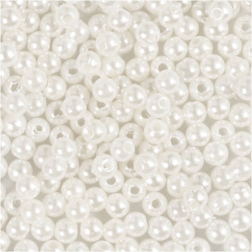 Närbild på små vaxpärlor 4 mm i pärlemor.